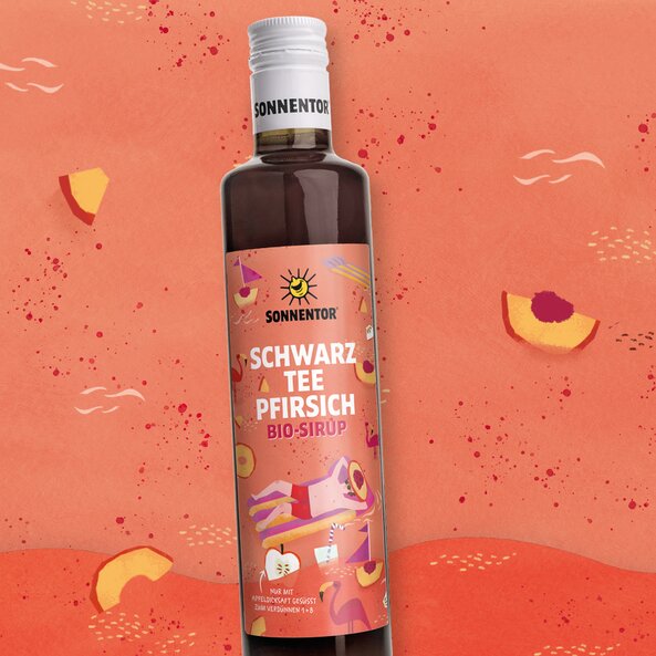Sonnentor black tea peach organic syrup bottle with peach illustrations